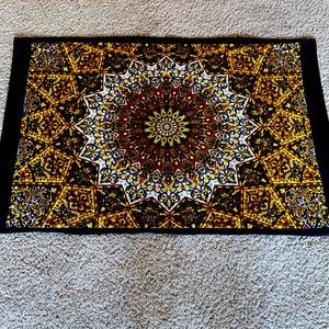 Yellow,brown,and black tapestry